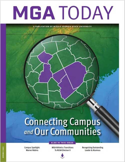 Cover image of MGA Today magazine, featuring a magnifying glass hovering over a map of Georgia.